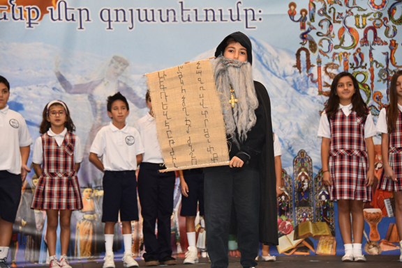 Students perform a play as part of Chamlian's Culture Day