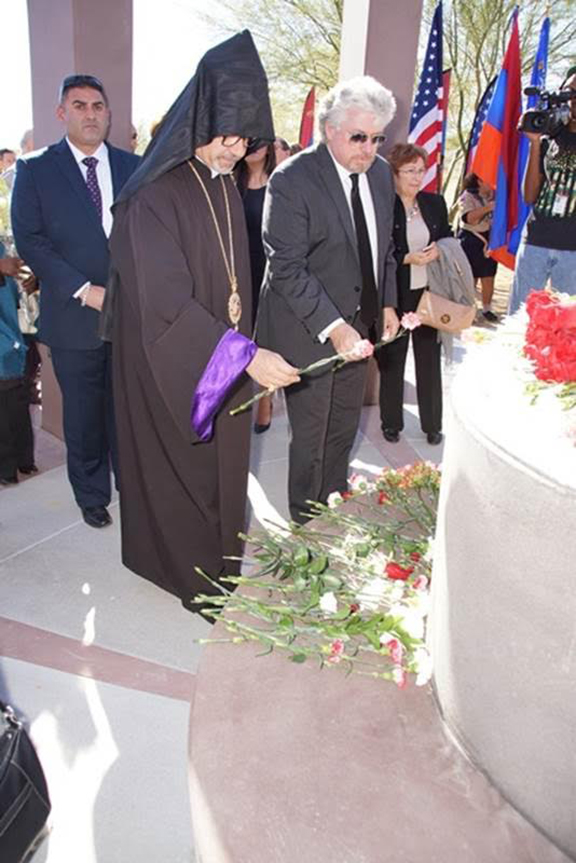 Archbishop Mardirossian and Dr. Viken Hovsepian Placing Carnations at the "Eternal Circle"