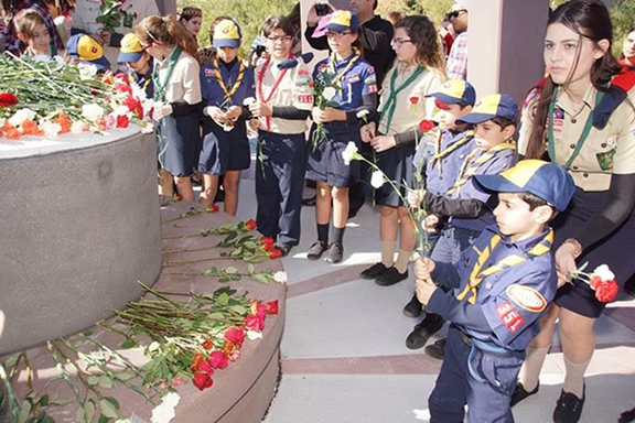 Homenetmen Scouts Placing Carnations at the "Eternal Circle"