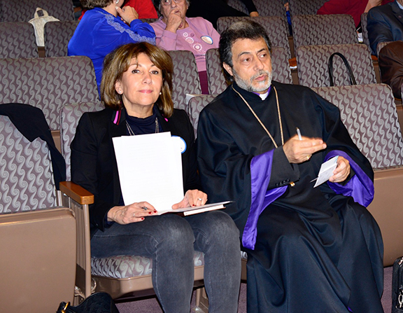 His Eminence Archbishop Hovnan Derderian, Primate of the Western Diocese, seated with Maria Mehranian preparing to deliver their remarks.