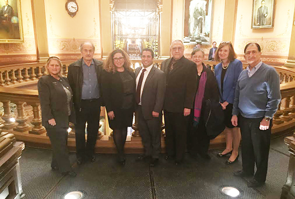 Members of the AGEC with Rep. Kesto after the vote. From l to r, Marjorie Nanian, Edward Bedikian, Lara Nercessian, Rep. Klint Kesto (MI-39), Edward Haroutunian, Susan Haroutunian, Corrine Khederian, and Greg Dildilian.