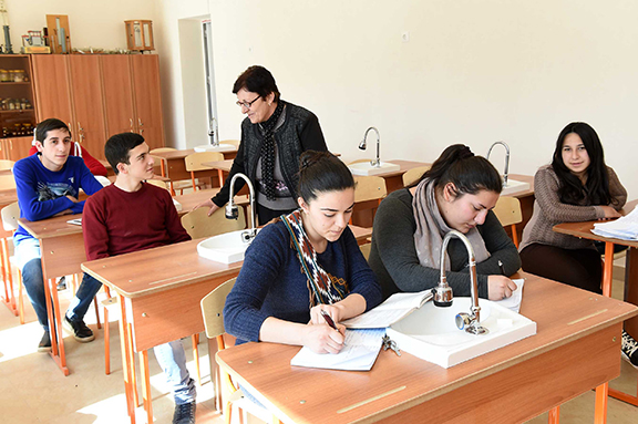 Students of Oshakan School in a renovated classroom.