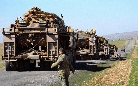 Turkish Army near the Syrian border last February. (Source: AFP Photo/Ilyas Akengin)