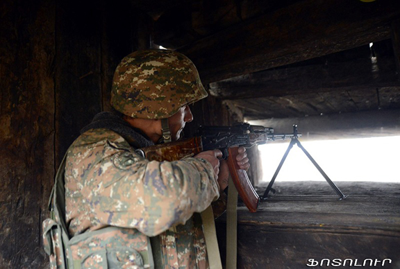 Artsakh soldier on the frontlines. (Source: Photolure)