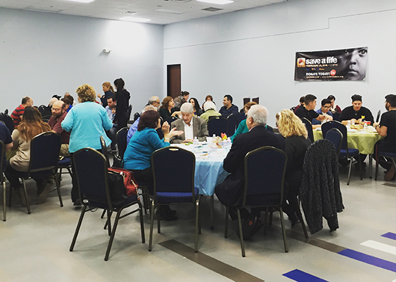 Over a 100 people gathered at the community breakfast benefiting SARF.