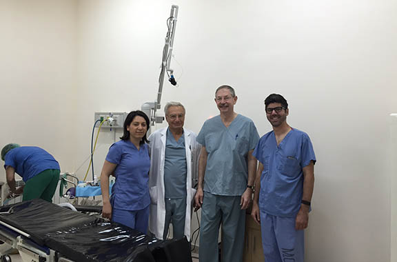 Dr. Lilit Garibyan, Dr. Nishan Goudsouzian, Dr. Rox Anderson and Dr. Ray Jalian in the operating room at Arabkir Pediatric Hospital right before starting the treatment cases.