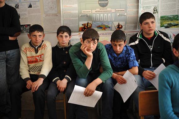 Students of the school in Martuni receiving various educationals from the different NGOs.