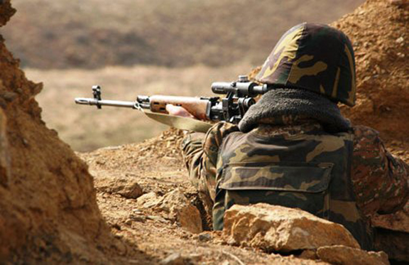 A soldier from the Karabakh Defense Army in the front lines. (Source: Public Radio of Armenia) 