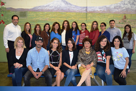 Chamlian Alumni who volunteered at Read Across America Day along with the school administration.