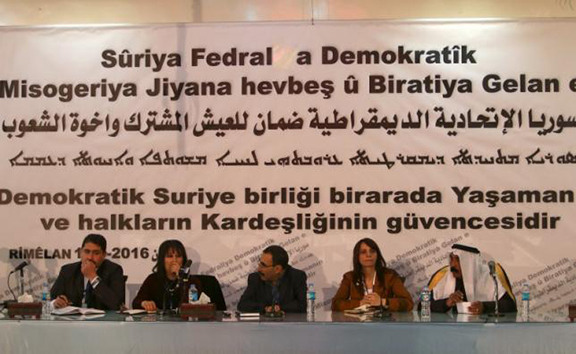 Bureau members of a preparatory conference to announce a federal system discuss a 'Democratic Federal System for Rojava - Northern Syria' in the Kurdish-controlled town of Rmeilan, Hasaka province, Syria March 16, 2016. (Source: Reuters/Rodi Said) 