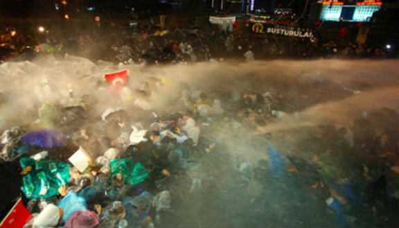 More images of Turkish police raiding those who were gathered outside the headquarters. (Source: Today's Zaman)