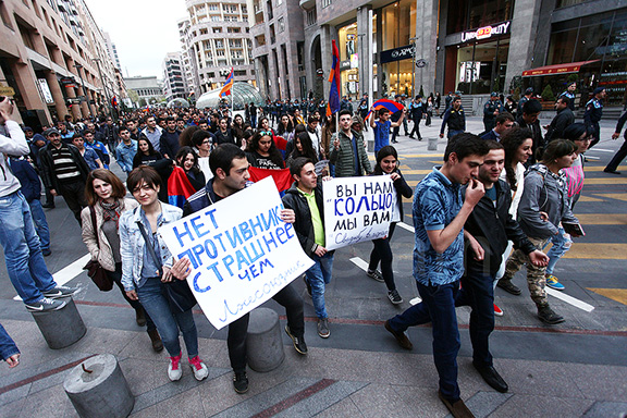 Protesters marched to the Russian Embassy in Yerevan to demand an end to Moscow's arms sales to Baku