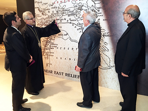 Western Prelate Archbishop Moushegh Mardirossian previews the "Armenia: An Open Wound" exhibit in Glendale