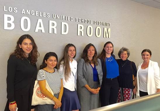 Board Member Moníca Ratliff is flanked by guests, from left, ANCA-WR Government Affairs Director Tereza Yerimyan, ANCA-WR Intern Lusine Aslanyan, ANCA- WR Events Coordinator Lori Sinanian, ANCA-WR Intern Nayiri Partamian, ANCA-WR Education Committee Member Sarine Boyadjian and ANCA-WR Education Committee Member Dr. Kay Mouradian for the resolution commemorating the Armenian Genocide of 1915.