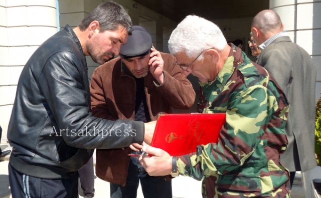 People gather on Saturday at the Artsakh Freedom Fighters' Association to enlist