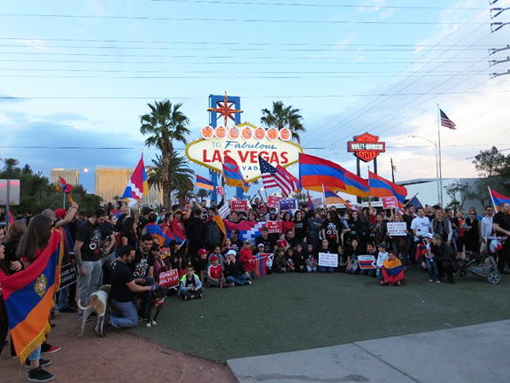 "March for Justice" where 300 Armenians marched from Town Square on Las Vegas Boulevard towards the landmark "Welcome to Las Vegas Sign" holding banners, U.S. and Armenian flags.