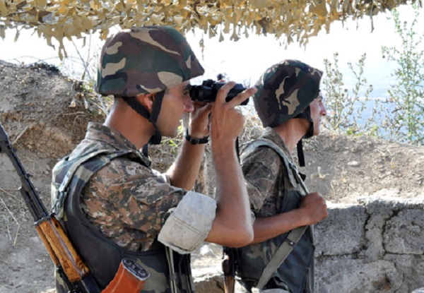 Armenian soldiers at an army post at the Artsakh-Azerbaijan border