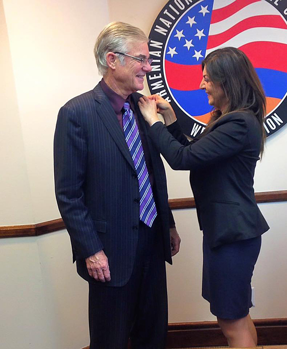 ANCA-WR Executive Director Elen Asatryan gifts Superintedent Torlakson with the original ANCA pin