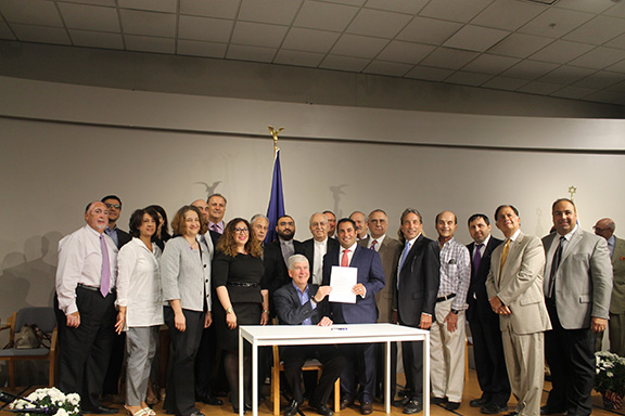 Michigan Governor Rick Snyder signs into law HB4493 mandating the teaching of the Armenian Genocide and Holocaust (as well as other genocides) in Michigan public schools on June 27