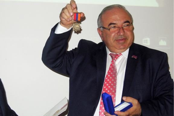Member of Parliament , Aragats Akhoyan presents William Saroyan medal 