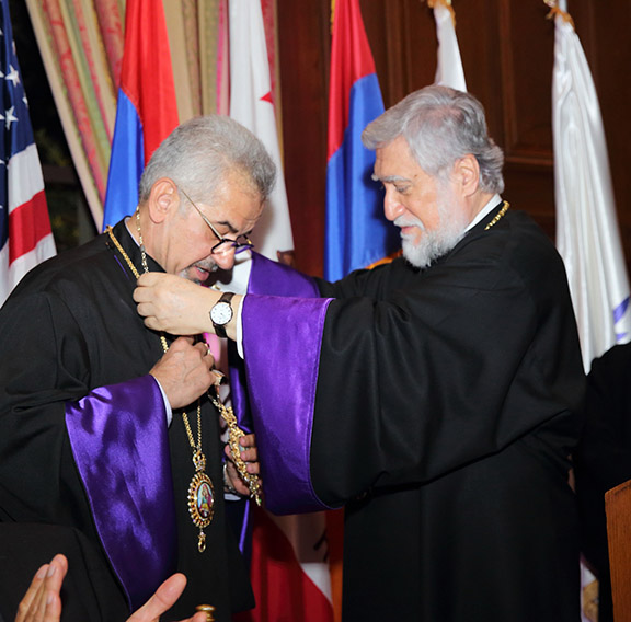 Catholicos Aram I bestows a gift to Western Prelate Archbishop Moushegh Mardiriossian