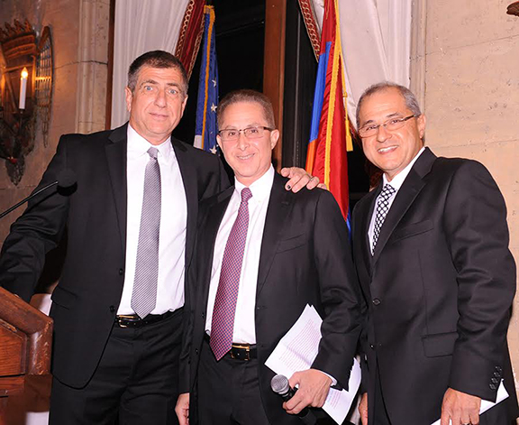 Paul Kalemkiarian, with Co-Chairs Gary Phillips and Jack Muncherian