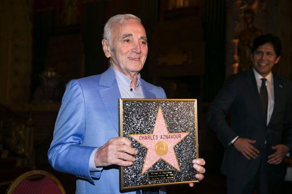 Charles Aznavour receives honorary Hollywood star Plaque on October 27, 2016 (Photo: AFP)