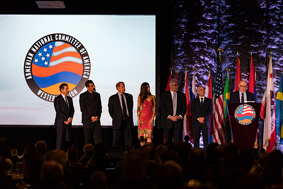 Academy Award-winning Director Terry George giving his remarks about Armenian Genocide film "The Promise," joined on stage by producer Mike Medavoy, actress Angela Sarafyan, musician Serj Tankian, and producer Kevin Matossian