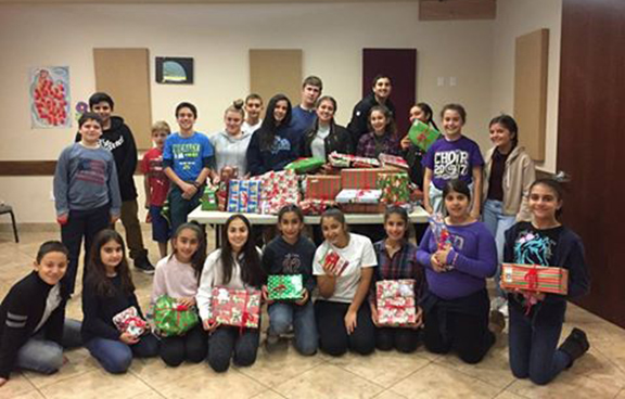 AYF Burbank Juniors “Gaidzag” Chapter members donated more than eighty gifts to children in Goris and neighboring villages in Armenia. 