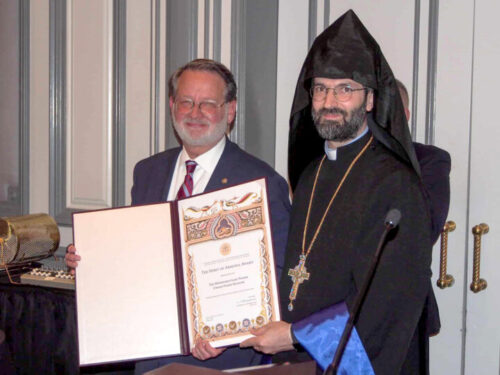 Senator Gary Peters (D-MI) receiving the “Spirit of Armenia” Award from the Prelacy of the Armenian Apostolic Church of Eastern US Vicar, Rev. Fr. Sahag Yemishian.